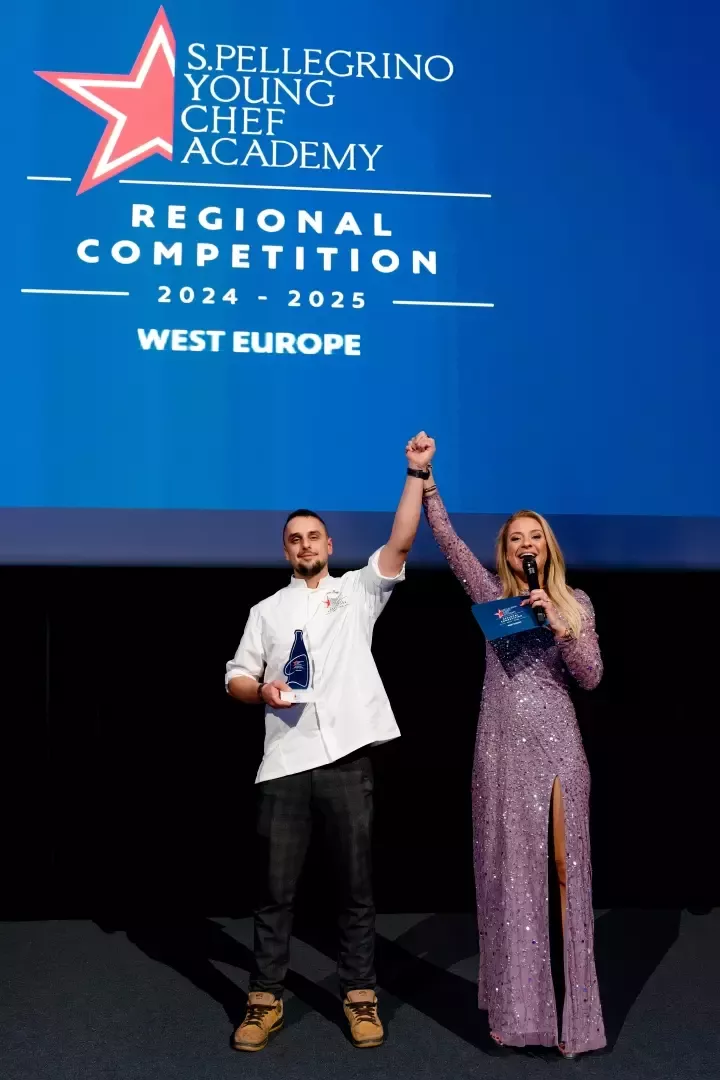 Single winner holding a trophy